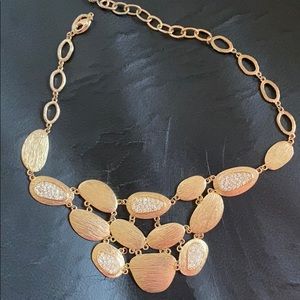 Unique. Necklace and bracelet gold tone